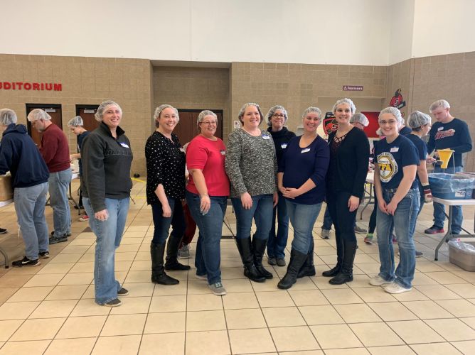 Lakeland Care staff volunteering at Meals of Hope.