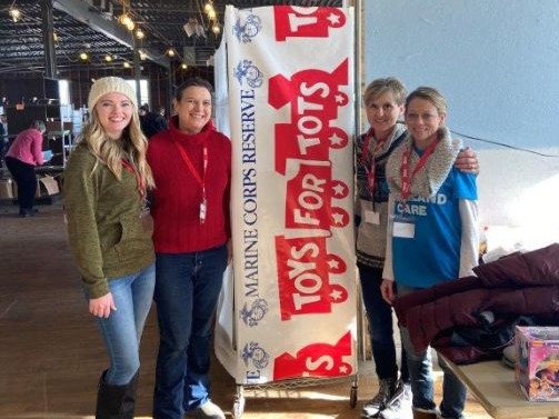 Lakeland Care employees volunteering for Toys for Tots