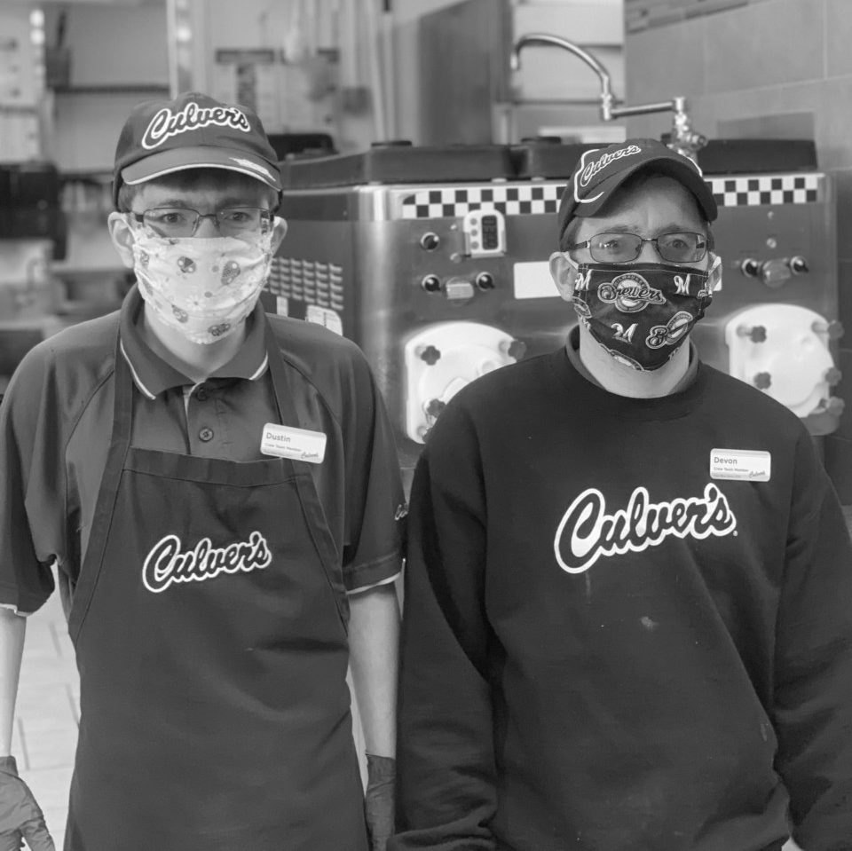Two brothers posing for a picture at work at a local Culver's restaurant.